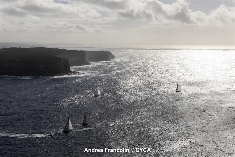 Fleet leaving Sydney Harbour at last - Ponant Sydney to Noumea Race photo copyright Andrea Francolini taken at Cruising Yacht Club of Australia and featuring the IRC class