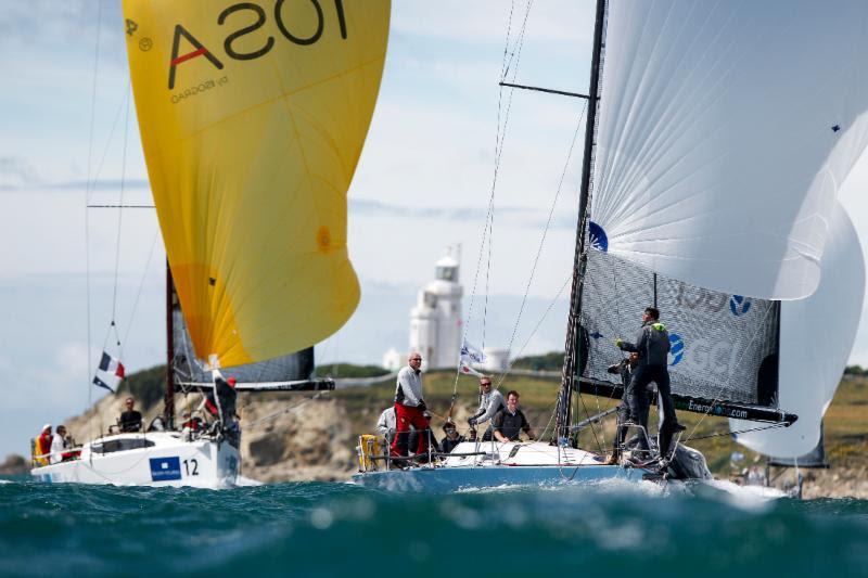 Passing St Catherine's Lighthouse on the southern tip of the Isle of Wight in the 2016 Commodores' Cup, Rod Stuart and Bill Ram's Corby 37 Aurora, with Marc Alperovitch's JPK 10.80 Timeline just astern photo copyright Paul Wyeth taken at Royal Ocean Racing Club and featuring the IRC class