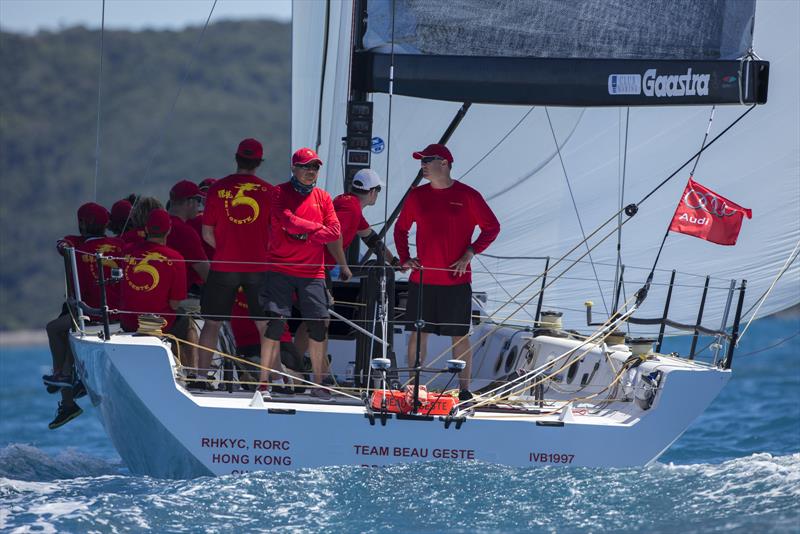 Gavin Brady (right facing) and Karl Kwok (left facing) plus Beau Geste crew at Hamilton Island Race Week photo copyright Andrea Francolini taken at Hamilton Island Yacht Club and featuring the IRC class