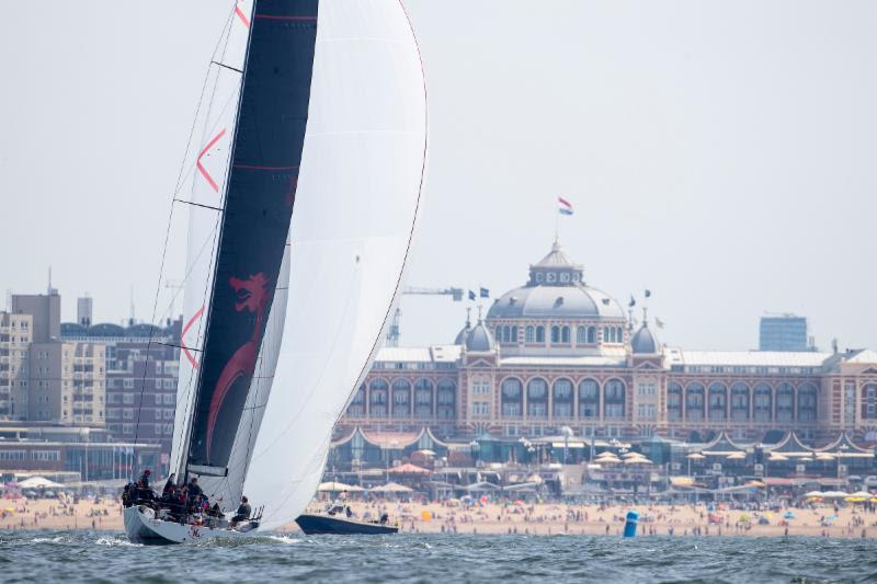 Beau Geste heads at their gold medal finish with beachgoers enjoying another fabulous day - Hague Offshore Sailing World Championship 2018 photo copyright Sander van der Borch taken at Jachtclub Scheveningen and featuring the IRC class