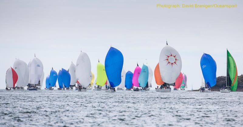 Racing past Weaver's Point, Crosshaven in the 16 nautical-mile Harbour Race that included a massed start and sailpast the historic town of Cobh at Volvo Cork Week organised by the Royal Cork Yacht Club photo copyright David Branigan / Oceanspor taken at Royal Cork Yacht Club and featuring the IRC class