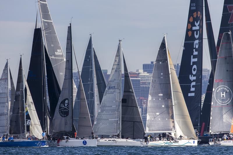 Fours supermaxis on the start line are pretty easy to identify in the light conditions. You know this is so when even a 51-footer (Primitive Cool) looks small photo copyright Andrea Francolini taken at Cruising Yacht Club of Australia and featuring the IRC class