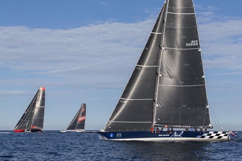 Black Jack still with headsail, as Comanche looks to go BIG photo copyright Andrea Francolini taken at Cruising Yacht Club of Australia and featuring the IRC class