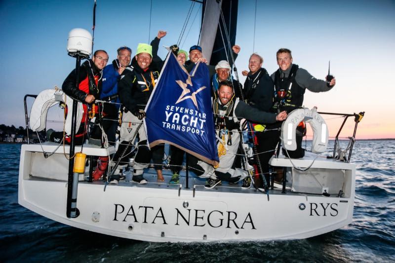 A jubilant crew on Pata Negra after crossing the RYS finish line in the Sevenstar Round Britain and Ireland Race ahead of their IRC competitors photo copyright Paul Wyeth / RORC taken at Royal Ocean Racing Club and featuring the IRC class