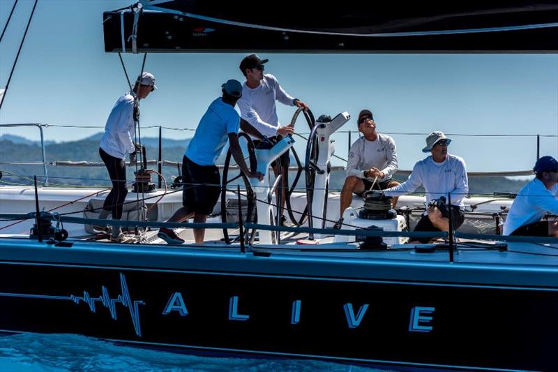 Will Tiller steering Alive photo copyright Kurt Arrigo taken at Hamilton Island Yacht Club and featuring the IRC class