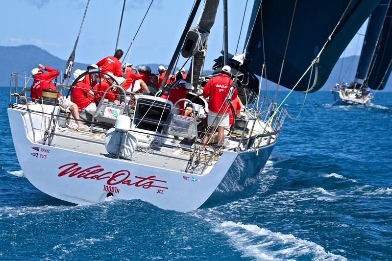 All concentration on Wild Oats XI as she chases Black Jack - Hamilton Island Race Week - Day 5 photo copyright Richard Gladwell taken at Hamilton Island Yacht Club and featuring the IRC class