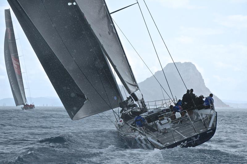 Black lack chases Wild Oats XI into a rain squall - Hamilton Island Race Week - Day 6 - photo © Richard Gladwell