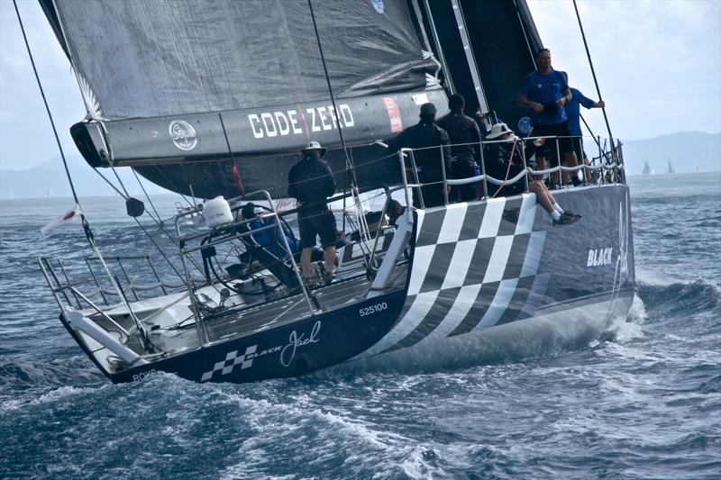 Black Jack climbs over Wild Oats XI to leeward in the rain squall - Hamilton Island Race Week - Day 6 photo copyright Richard Gladwell taken at Hamilton Island Yacht Club and featuring the IRC class