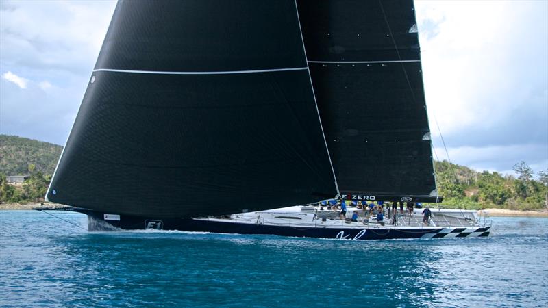 Black Jack creates a solar eclipse in Dent Passage heading for the finish - Hamilton Island Race Week - Day 6 photo copyright Richard Gladwell taken at Hamilton Island Yacht Club and featuring the IRC class