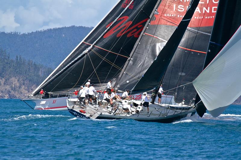 Wild Oats XI broaches ahead of Alive - Hamilton Island Race Week - Day 5 photo copyright Richard Gladwell taken at Hamilton Island Yacht Club and featuring the IRC class