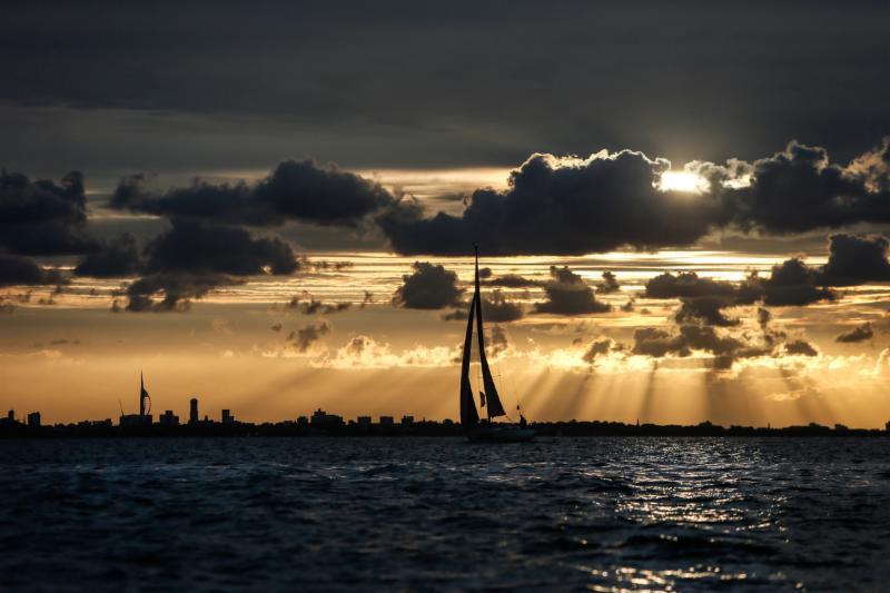 Sunrise as British Beagle makes her way to the finish line at the Royal Yacht Squadron in Cowes - photo © Paul Wyeth