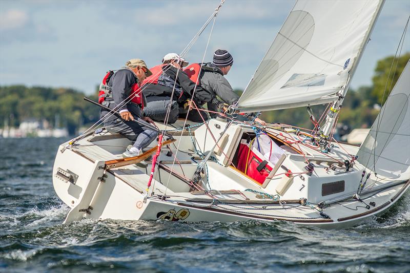 Skipper Benz Faget and his Gulf Yachting Association crew keep an eye to leeward on the opening day of the U.S. Adult Sailing Championship photo copyright J H Peterson taken at Wayzata Yacht Club and featuring the IRC class