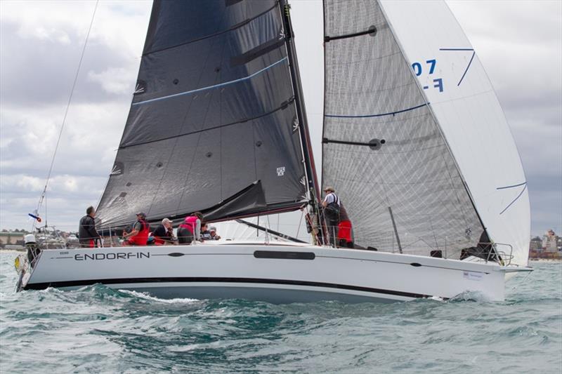 Endorfin rounds the first mark in last place after a delay in leaving her marina berth - photo © Bernie Kaaks