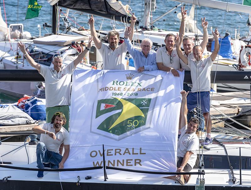Géry Trentesaux and his crew on Courrier Recommandé, overall winners at the 2018 Rolex Middle Sea Race photo copyright Rolex / Kurt Arrig taken at Royal Malta Yacht Club and featuring the IRC class