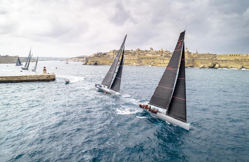 Momo leads Rambler out of the Grand Harbour shortly after the Rolex Middle Sea Race Start photo copyright Rolex / Kurt Arrig taken at Royal Malta Yacht Club and featuring the IRC class