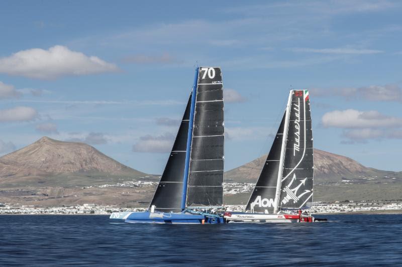 Enjoying a duel through the Canary Islands: Peter Cunningham's MOD70 PowerPlay and Giovanni Soldini's Multi 70 Maserati RORC Transatlantic Race - photo © Mikel Prieto