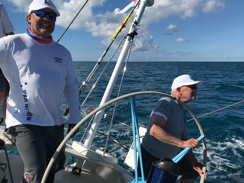 Rear Adm. (ret.) Bill Merlin drives across the finish line the Newport Bermuda Race. He sailed his first two Newport Bermuda races in 1954 and 1956 photo copyright Chris Museler taken at Royal Bermuda Yacht Club and featuring the IRC class