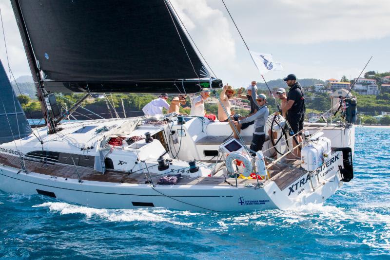 Ready to celebrate their arrival on the dock at C&N Port Louis Marina - 2018 RORC Transatlantic Race - photo © RORC / Arthur Daniel