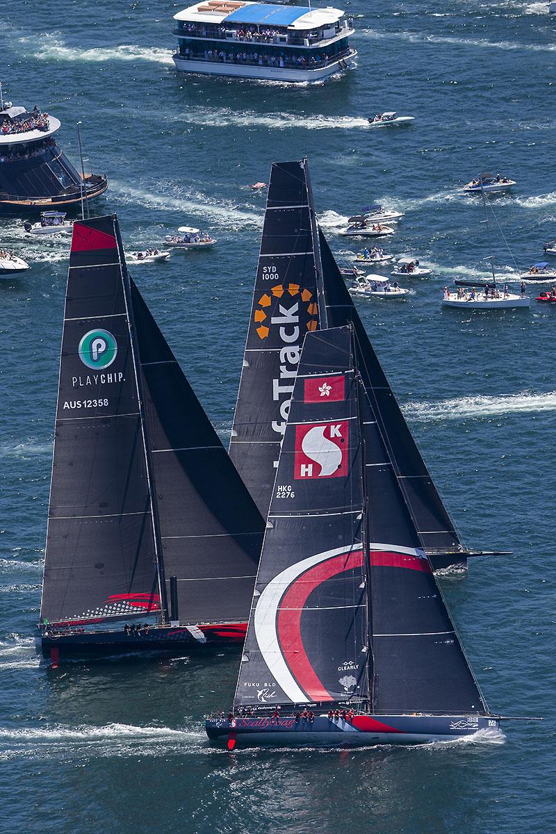 The three beamy super maxis thrill part of the massive spectator fleet - 2018 RSHYR photo copyright Andrea Francolini taken at Cruising Yacht Club of Australia and featuring the IRC class