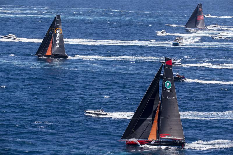 Comanche (foreground) begins her rise to the top, after rounding Zulu in sixth place. InfoTrack in front with Wild Oats XI inshore. Giddy up! 2018 RSHYR photo copyright Andrea Francolini taken at Cruising Yacht Club of Australia and featuring the IRC class