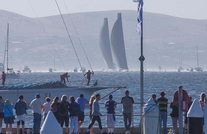 Line Honours winner Wild Oats XI enters the dock while Black Jack and Comanche still battle out the minor placings - Rolex Sydney Hobart Yacht Race 2018 - photo © Crosbie Lorimer