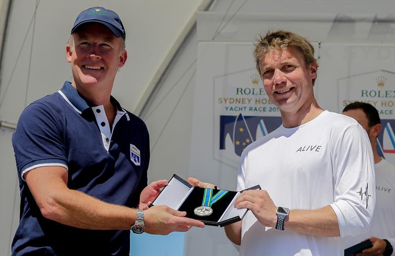 Wouter Verbraak is presented his winning crew medal by Tasmanian Premier, Will Hodgman photo copyright Crosbie Lorimer taken at Cruising Yacht Club of Australia and featuring the IRC class