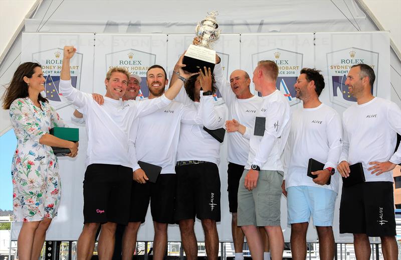 The Alive crew celebrate their win photo copyright Crosbie Lorimer taken at Cruising Yacht Club of Australia and featuring the IRC class