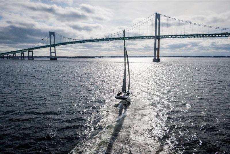The Mule, American Magic's 38-foot test boat, flies on its foils near Rhode Island's Claiborne Pell Newport Bridge photo copyright American Magic taken at New York Yacht Club and featuring the IRC class