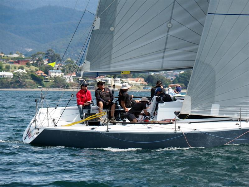 Cruising (spinnakers) Division 1 fleet tacking close under Kangaroo Bluff - Crown Series Bellerive Regatta - photo © Peter Campbell