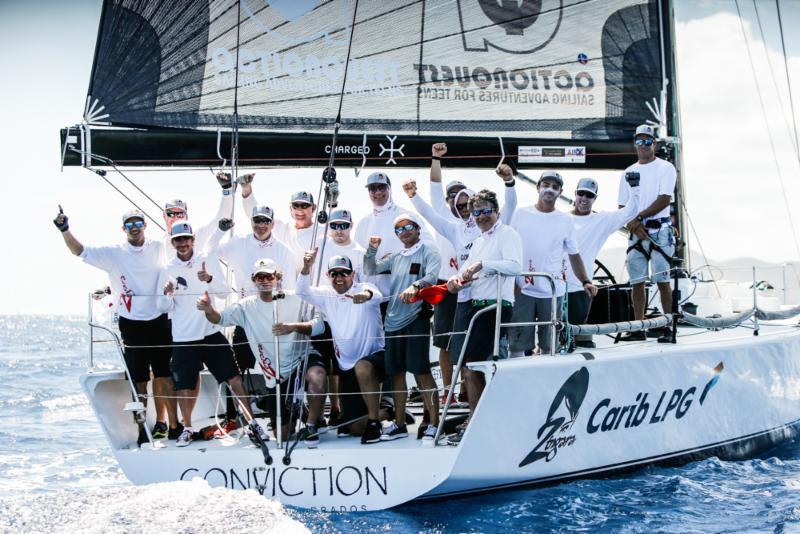 TP52 Zingara (Conviction) take home the 1925 Sterling Silver Peters & May Trophy for their overall win on corrected time, plus line honours trophy - 2019 Peters & May Round Antigua Race photo copyright Paul Wyeth / pwpictures.com taken at Antigua Yacht Club and featuring the IRC class