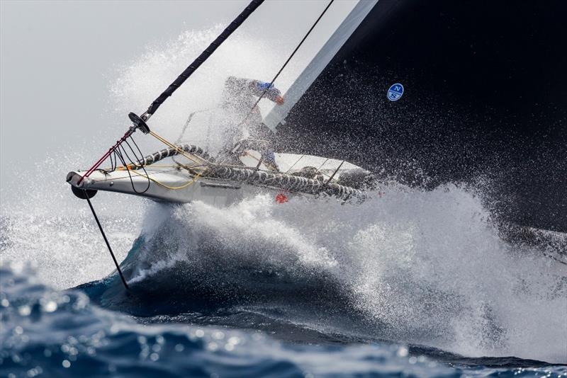 Wet ride on the bow of George David's Rambler 88. - Rolex Giraglia 2019 photo copyright IMA / Studio Borlenghi taken at Yacht Club Italiano and featuring the IRC class