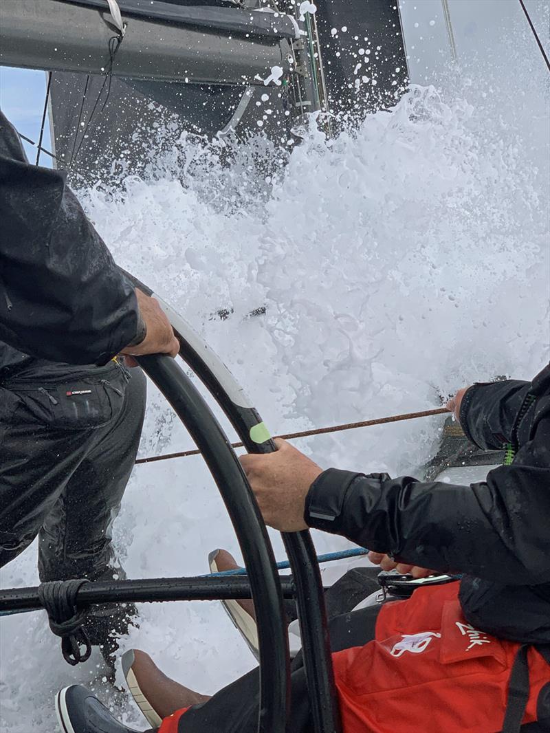 Water over the deck of Chinese Whisper - Lendlease Brisbane to Hamilton Island Yacht Race photo copyright Supplied taken at Royal Queensland Yacht Squadron and featuring the IRC class