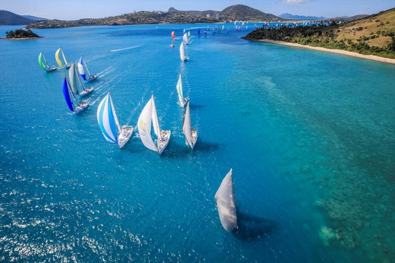 Fleet rounding Dent Island on day 2 of Hamilton Island Race Week photo copyright Salty Dingo taken at Hamilton Island Yacht Club and featuring the IRC class