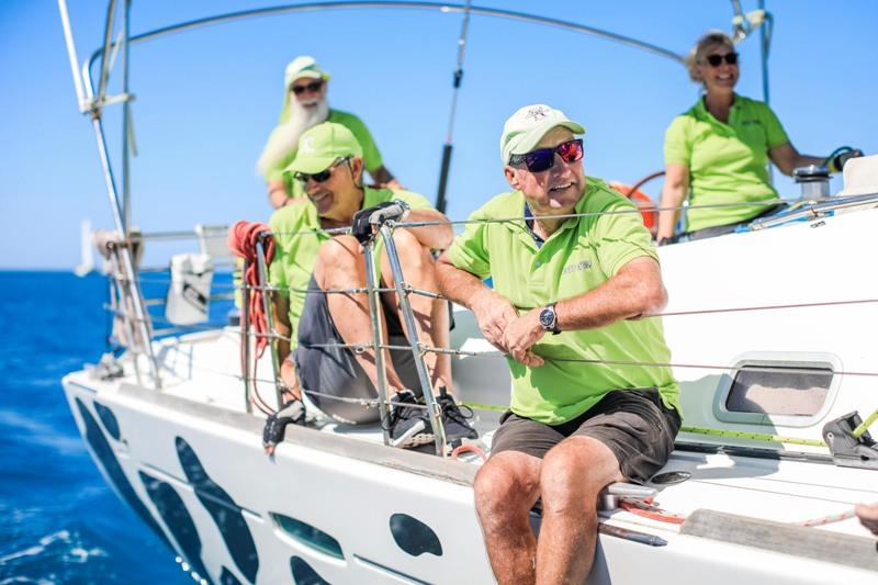 Holy Cow crew at Race Week - Hamilton Island Race Week photo copyright Salty Dingo taken at Hamilton Island Yacht Club and featuring the IRC class