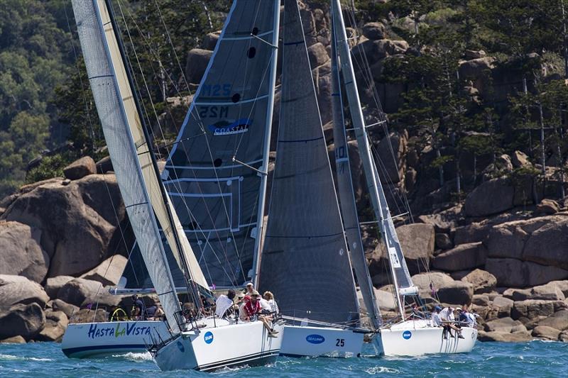 Close tacking off the rocks on Day 1 - 2019 SeaLink Magnetic Island Race Week photo copyright Andrea Francolini taken at Townsville Yacht Club and featuring the IRC class