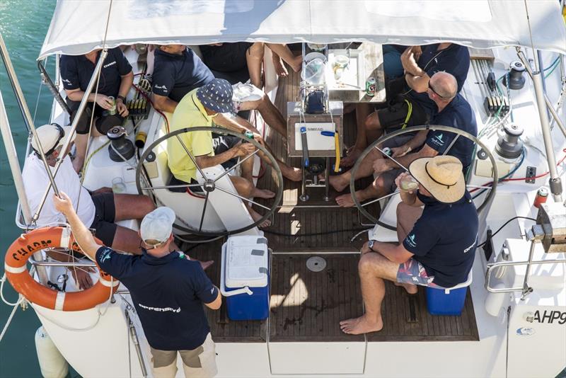 Cocktail hour on Charm Offensive - SeaLink Magnetic Island Race Week photo copyright Andrea Francolini taken at Townsville Yacht Club and featuring the IRC class