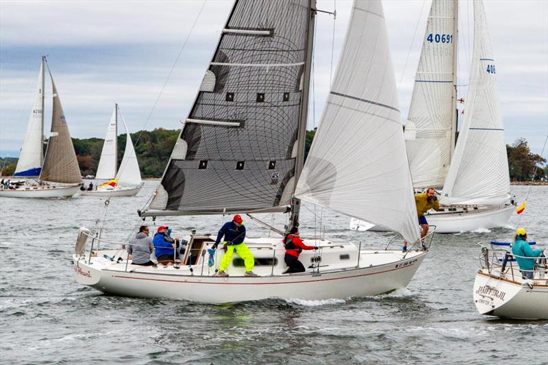 John Ekberg and crew on Foolish Pleasure cross the start line for Class 7 - The 64th Gearbuster photo copyright Mary Alice Fisher taken at Indian Harbor Yacht Club and featuring the IRC class