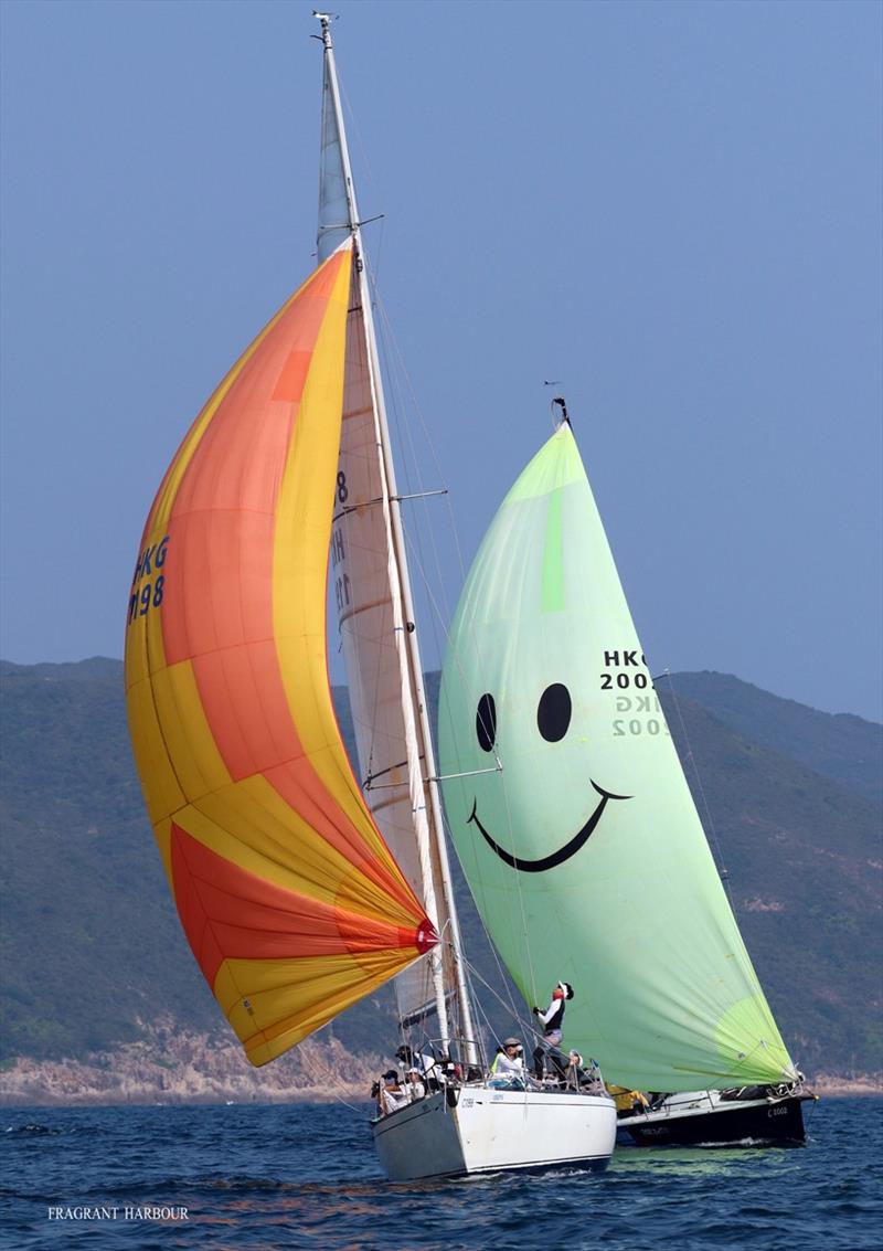 Colourful kites in easing breeze - Monsoon Winter Series , Race 1 photo copyright Chris Howarth taken at Hebe Haven Yacht Club and featuring the IRC class