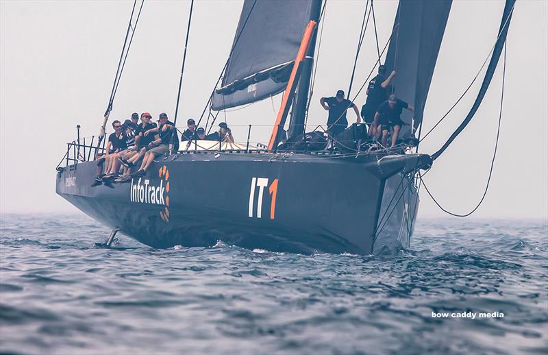 Infotrack looms out of the smoke - 2019 Grinders Coffee SOLAS Bog Boat Challenge - photo © Crosbie Lorimer