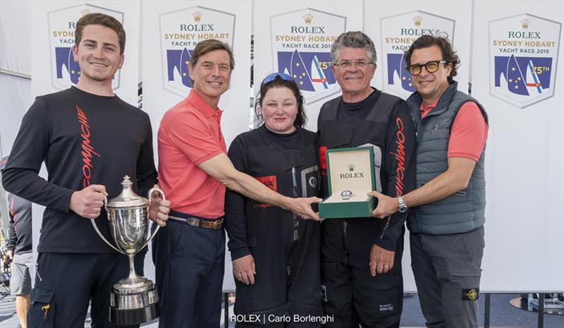 James Cooney, Laurent Delanney (Rolex Head of Global Sponsorships), Samantha Grant, Jim Cooney and Patrick Boutellier (General Manager of Rolex Australia) with the J.H. Illingworth Trophy and Rolex timepiece - Rolex Sydney Hobart Yacht Race photo copyright Carlo Borlenghi / Rolex taken at Cruising Yacht Club of Australia and featuring the IRC class