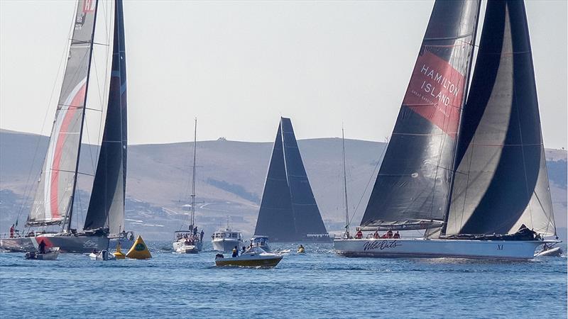 Wild Oats XI, Scallywag and Black Jack battle it out for 3rd, 4th and 5th position close to the finish line photo copyright Crosbie Lorimer taken at Royal Yacht Club of Tasmania and featuring the IRC class