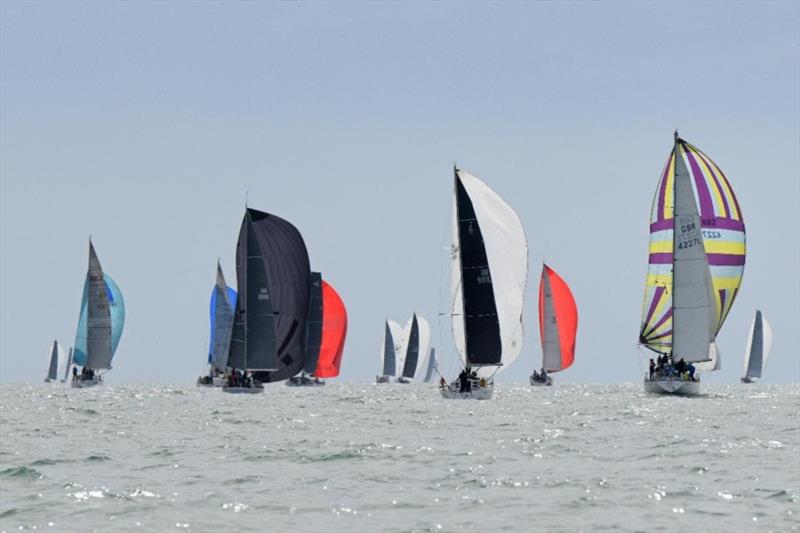 Fleet under spinnaker at the start of the RORC Channel Race photo copyright Rick Tomlinson / www.rick-tomlinson.com taken at Royal Ocean Racing Club and featuring the IRC class