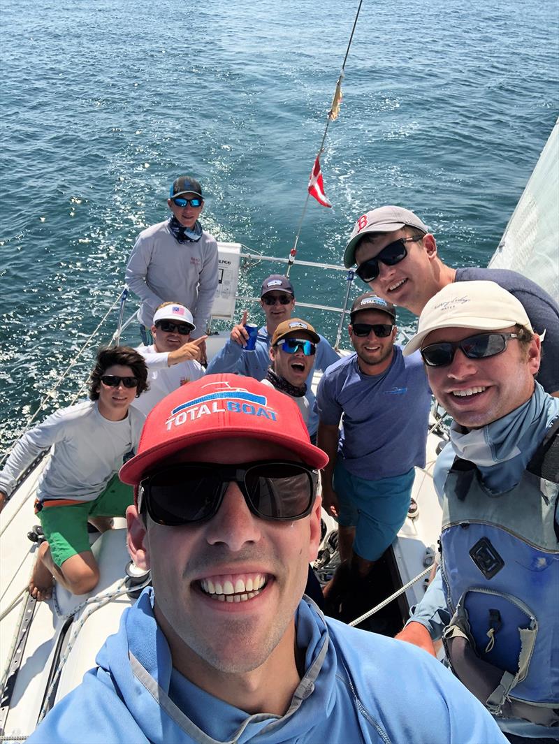 The skipper of Kanga, Camden Tougas (right, white hat), with his crew. Forefront: tactician Ellis Tonissi; Far Rear: trimmer Luke Tougas - photo © Team Kanga