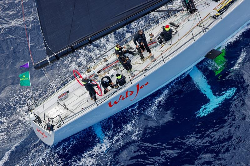 The crew onboard Marton Jozsa's Hungarian yacht Wild Joe fully focused on their next tactical manoeuvre photo copyright Carlo Borlenghi / Rolex taken at Royal Malta Yacht Club and featuring the IRC class