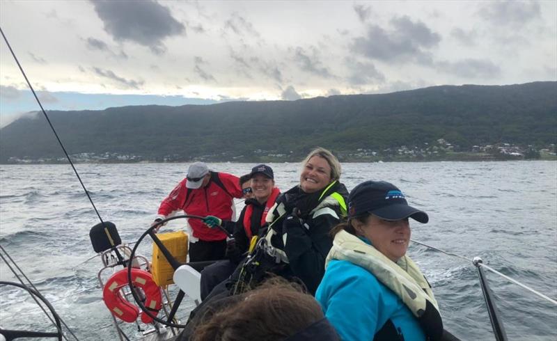 CYCA Treasurer Janey Treleaven (second from right, black jacket) and crew onboard her Beneteau First 45 photo copyright Janey Treleaven/Finn taken at Cruising Yacht Club of Australia and featuring the IRC class