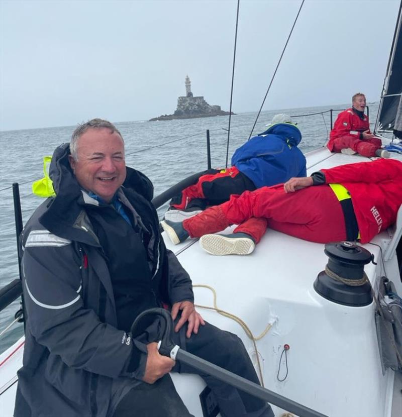 RORC Commodore, James Neville rounds the Fastnet Rock on his HH42 - photo © RORC