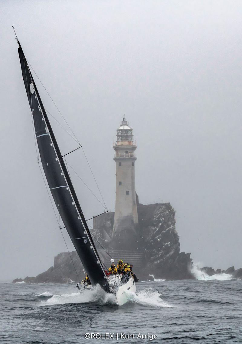 Andrew Hall's Pata Negra rounds the Fastnet Rock - 2021 Rolex Fastnet Race photo copyright Rolex / Kurt Arrigo taken at Royal Ocean Racing Club and featuring the IRC class