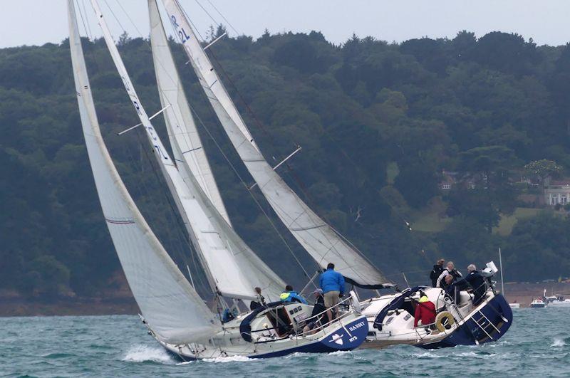 Bandit and Indigo post start in the Rossborough Round the Island Race photo copyright William Harris taken at Royal Channel Islands Yacht Club and featuring the IRC class