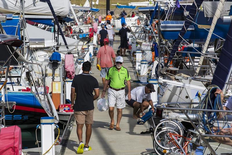 Crews get busy as they prepare to race - SeaLink Magnetic Island Race Week photo copyright Andrea Francolini taken at Townsville Yacht Club and featuring the IRC class