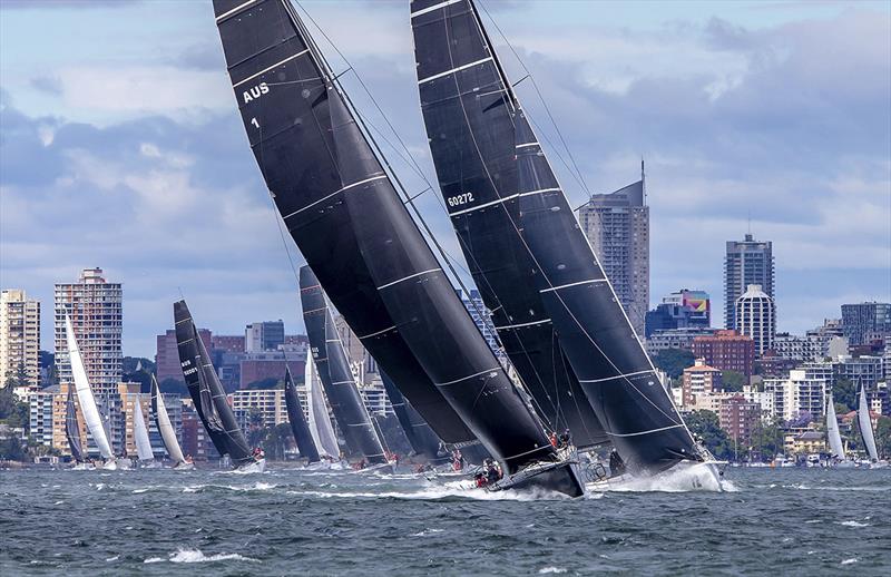 Moneypenny leads URM down Sydney Harbour photo copyright Bow Caddy Media taken at Cruising Yacht Club of Australia and featuring the IRC class